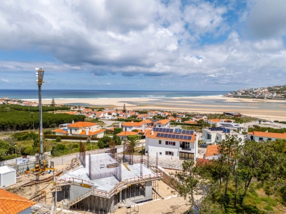 Moradia vista lagoa, praia e mar perto de vários campos de golfe
