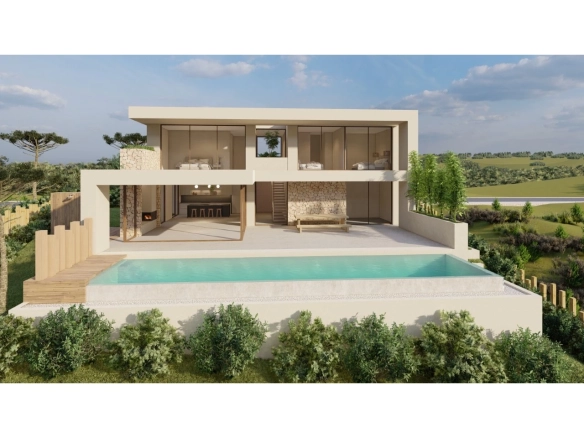 Moradia de luxo inserida num Golfe Resort junto à praia e com vista Mar